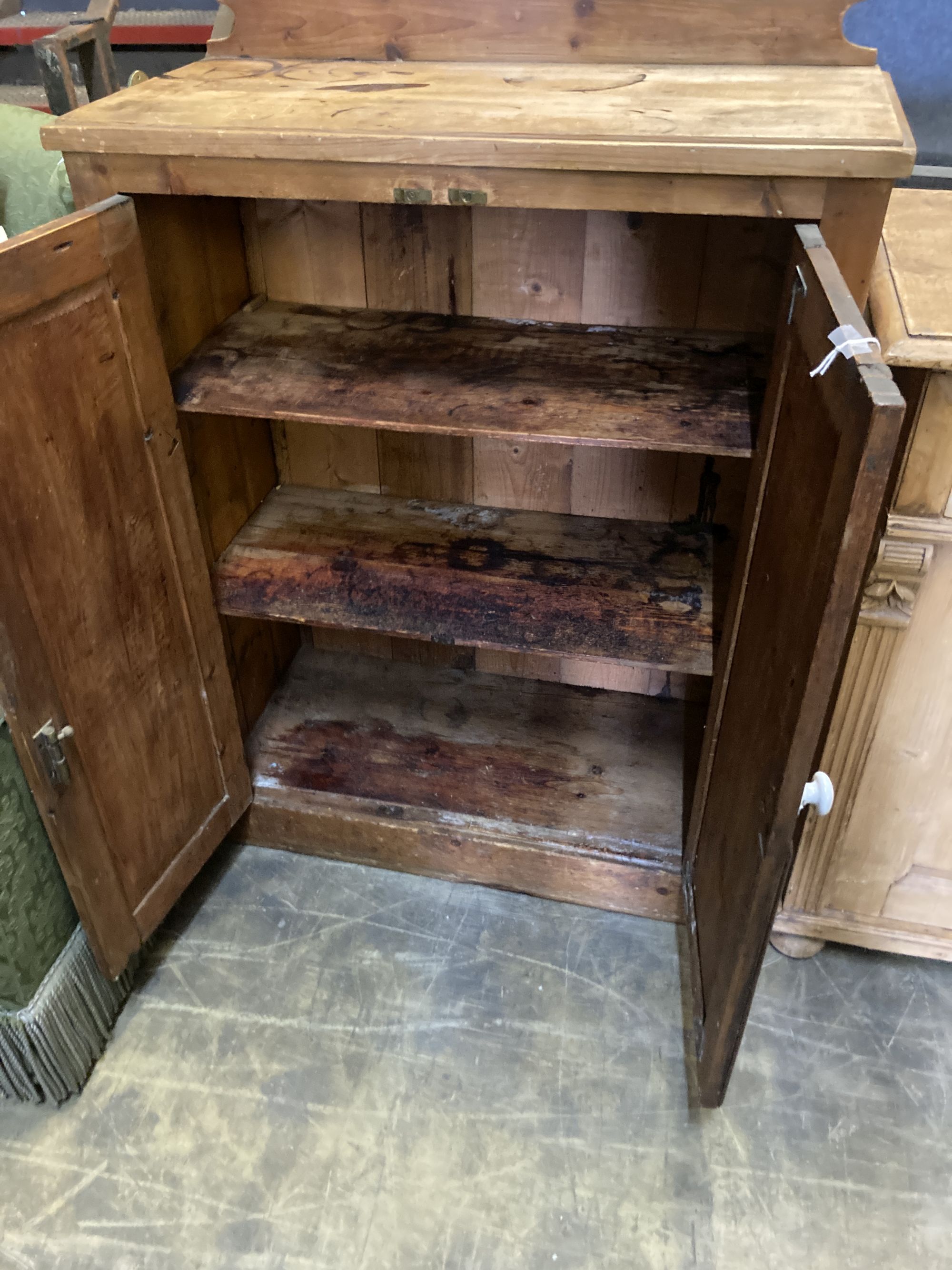 A Victorian pine two door cabinet, width 83cm, depth 38cm, height 115cm